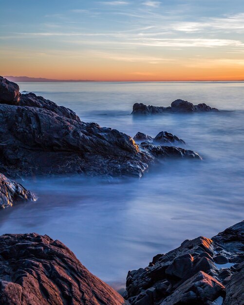 Foto vista panorámica del mar contra el cielo al atardecer