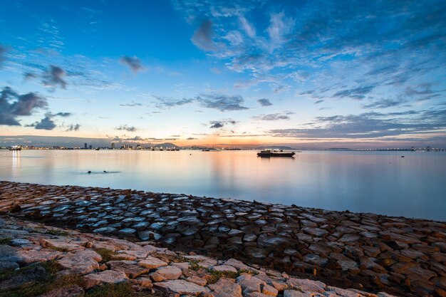 Foto vista panorámica del mar contra el cielo durante la puesta de sol