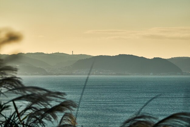 Foto vista panorámica del mar contra el cielo durante la puesta de sol