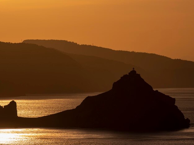 Foto vista panorámica del mar contra el cielo durante la puesta de sol