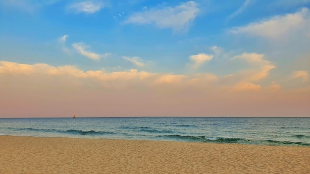 Foto vista panorámica del mar contra el cielo durante la puesta de sol