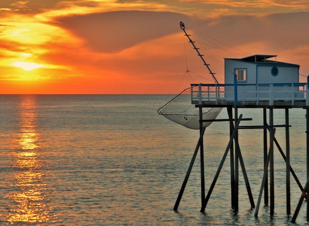 Foto vista panorámica del mar contra el cielo durante la puesta de sol