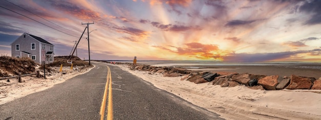 Foto vista panorámica de la playa contra el cielo durante la puesta de sol