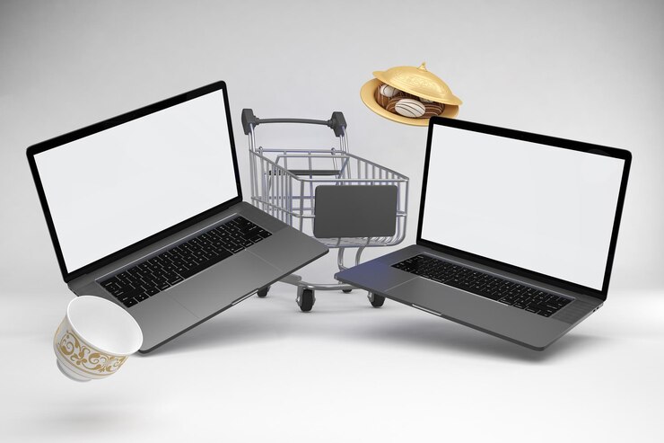 Foto vista en perspectiva de eid shopping trolley y laptops en fondo blanco