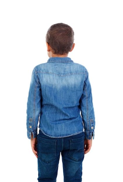 Vista posterior de un niño pequeño con camisa de mezclilla