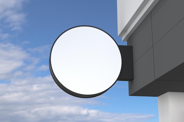 Vista en primer plano de un cartel en forma de círculo en blanco con un espacio blanco unido a la pared