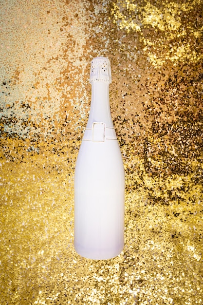 Foto vista superior de la botella de champán