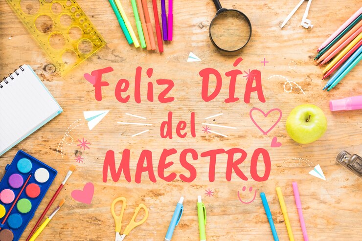 Foto vista superior de la celebración del día del maestro con suministros.