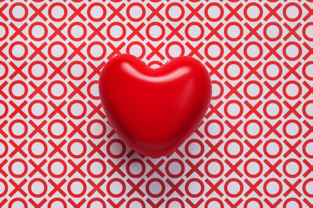 Vista superior del corazón rojo sobre fondo con ceros y cruces. Fondo de San Valentín con corazón e inscripciones XO.