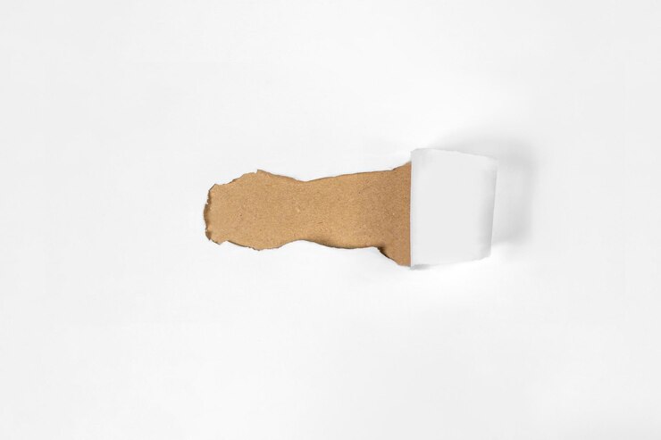 Foto vista superior de papel branco rasgado com fundo castanho mockup espaço de cópia presentação ou modelo colocação plana