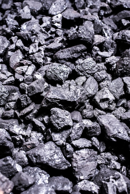 Vista superior de um mineral de mina de carvão preto para segundo plano. Usado como combustível para coque industrial.