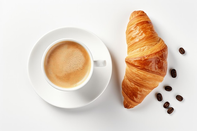 Vista superior de un desayuno francés con un croissant de taza de café y un elemento de diseño sobre un fondo blanco.