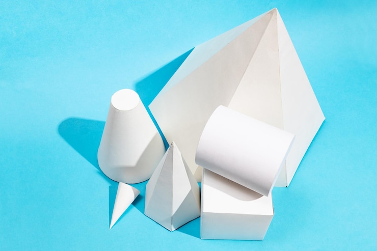 Foto vista superior de diferentes formas geométricas de papel