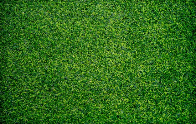 Vista superior do fundo verde da grama artificial. papel de parede e conceito de plano de fundo.