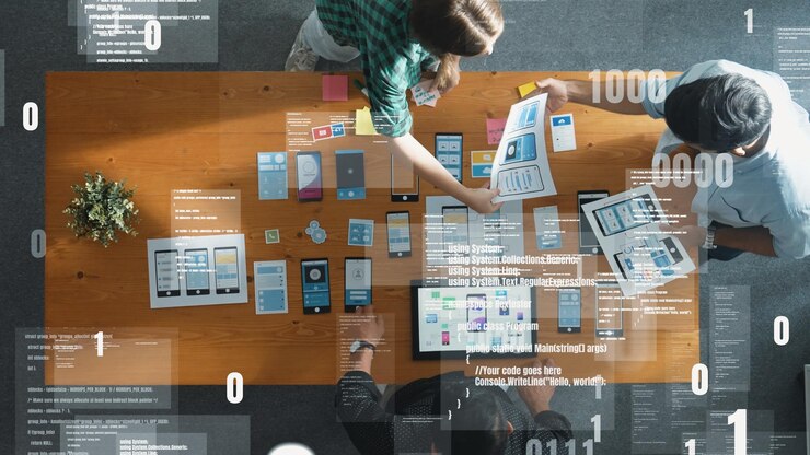 Foto vista superior del equipo de negocios que trabaja juntos para diseñar la convocatoria de diseño