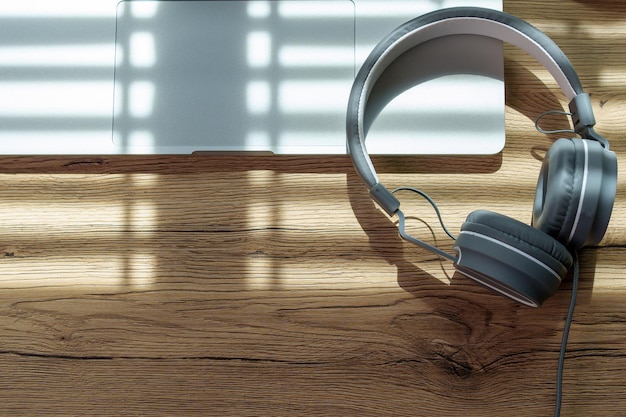 Vista superior de Foto de auriculares para música sobre fondo de escritorio de madera