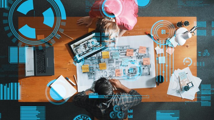 Foto vista superior del ingeniero que mantiene el plan del proyecto mientras el diseño se une a la reunión simposio