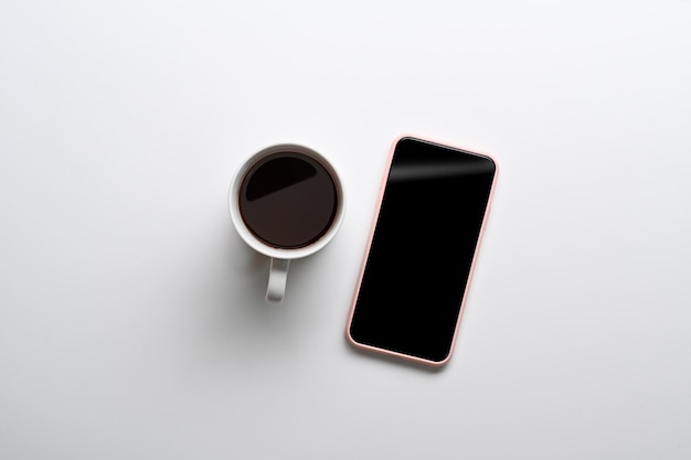 Vista superior de maqueta de teléfono móvil y taza de café sobre fondo blanco