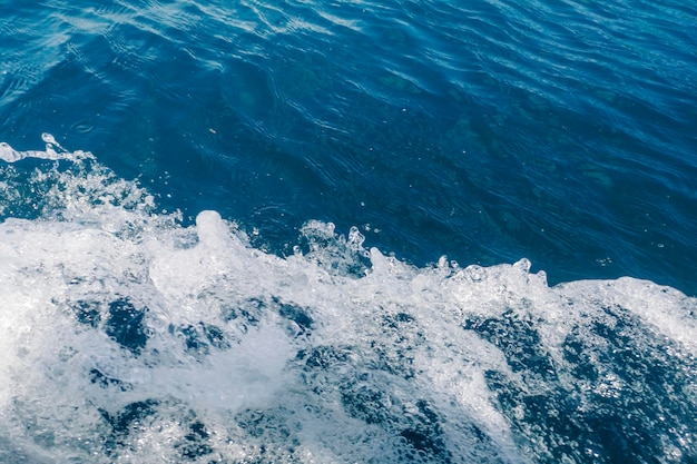 Vista superior de la ola oceánica, textura de agua, fondo de naturaleza