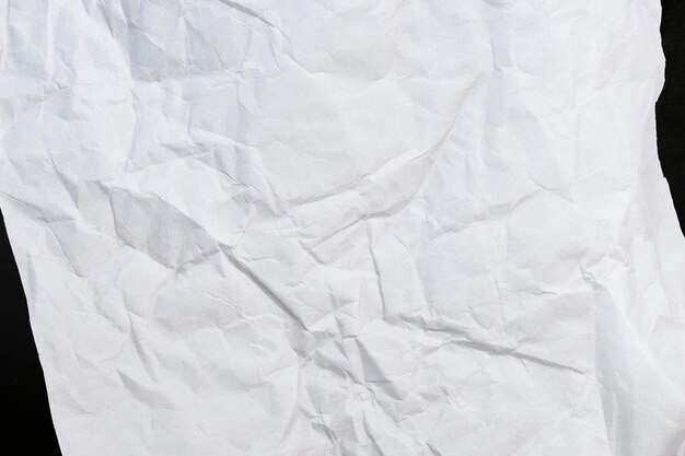 Vista superior de papel desmenuzado primer plano de hoja arrugada de papel blanco vista superior fondo de papel texturizado