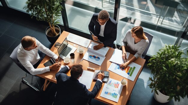 Foto vista superior de personas de negocios discutiendo el plan de negocios en la sala de reuniones imagen generada por ia