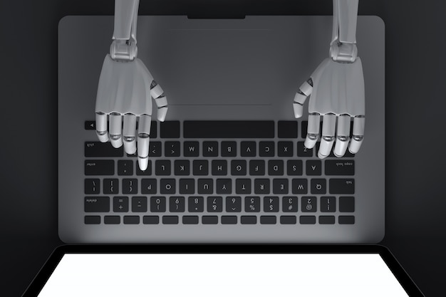 Vista superior del robot escribiendo en la computadora portátil