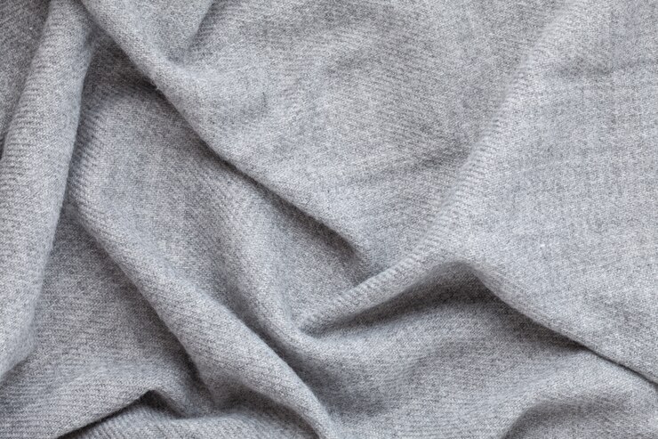 Foto vista superior sobre textura suave textil gris de lana