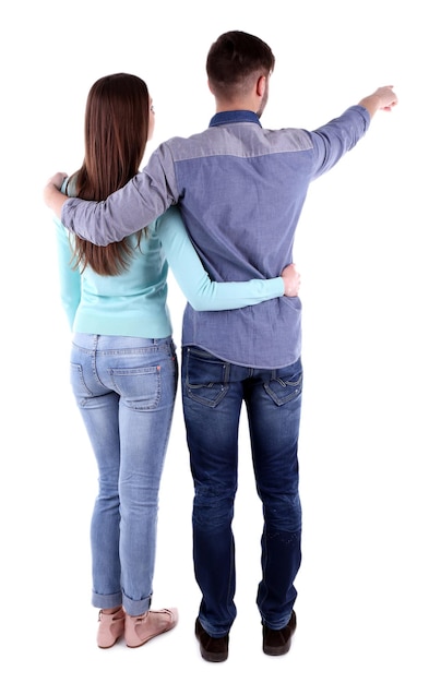 Foto vista traseira do jovem casal isolado no branco