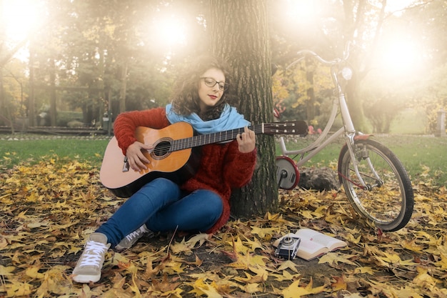 Voando em uma guitarra em um parque