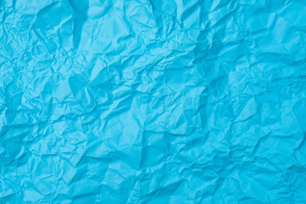 Vollbild von blauem, zerknittertem Papier