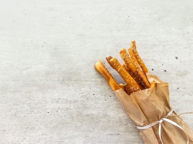 Vorspeise Hintergrund gebackene Bäckerei Brot Brotstangen Frühstück braun kariertes Handtuch Nahaufnahme gekocht Kopie Raum Cracker Handwerk köstliche Wohnung lag flach aromatisiert Lebensmittel Lebensmittel frisch