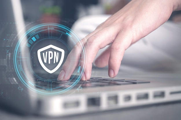 VPN Virtual Private Network-Protokoll Hand und Laptop Cyber-Sicherheit und Datenschutz-Verbindungstechnologie Anonymes Internet-Konzeptfoto