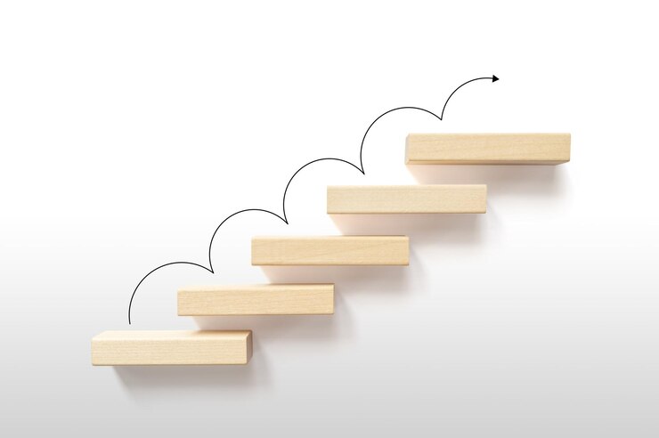 Foto wachstum oder steigerung des designkonzepts cube-block-treppe bewegungsschritt, der auf weißem hintergrund zum ziel heranwächst erfolgserreichung oder zielgeschäftsmotivation