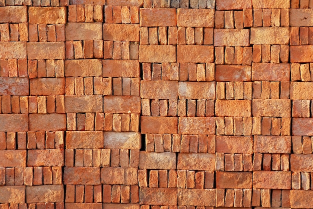 Foto wandbeschaffenheitshintergrund des roten backsteins