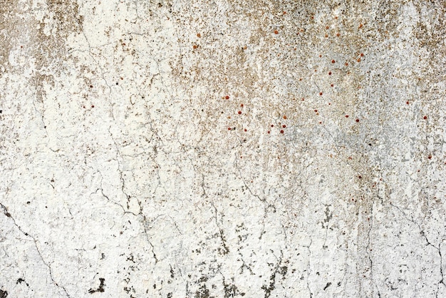 Wandbeschaffenheitshintergrund. Wandfragment mit Kratzern und Rissen