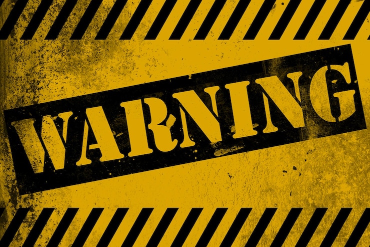 Foto warnschild gelb mit streifen