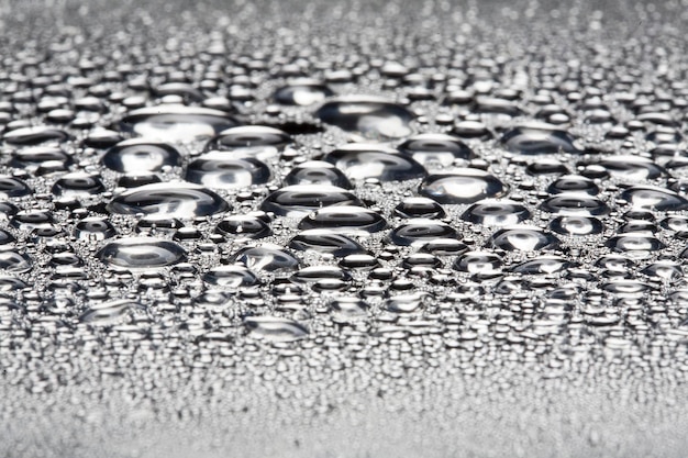 Foto wassertropfen auf metall eine schöne ungewöhnliche textur