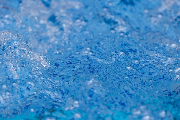 Wasserwellen Blasen auf blauem Hintergrund