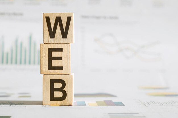 WEB símbolo Cubos de madera con palabras conceptuales WEB con espacio de copia Tecnología empresarial