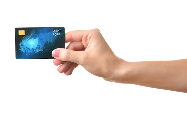 Weibliche Hand mit Kreditkarte auf Farboberfläche