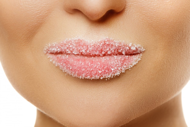 Weibliche Lippen mit Zucker