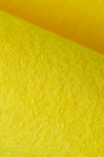 Weicher Filz Textilmaterial gelbe Farbe bunte Textur Klappe Stoff Hintergrund Nahaufnahme