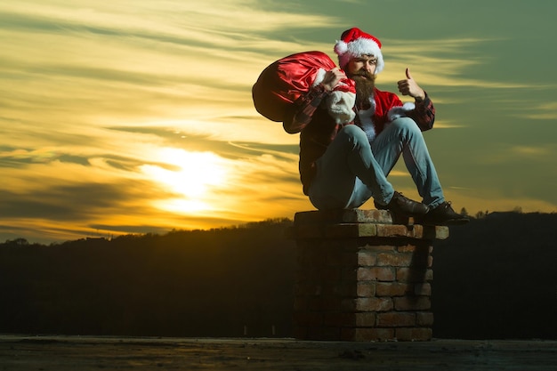 Weihnachten böser Weihnachtsmann auf Schornstein