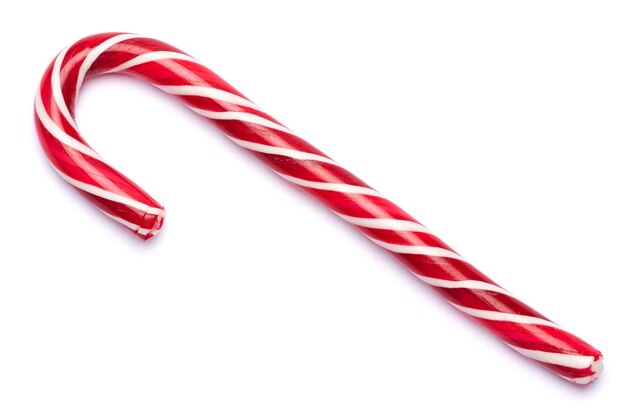 Foto weihnachten und neujahr konzept sweet christmas caramel stick isoliert auf weißem hintergrund