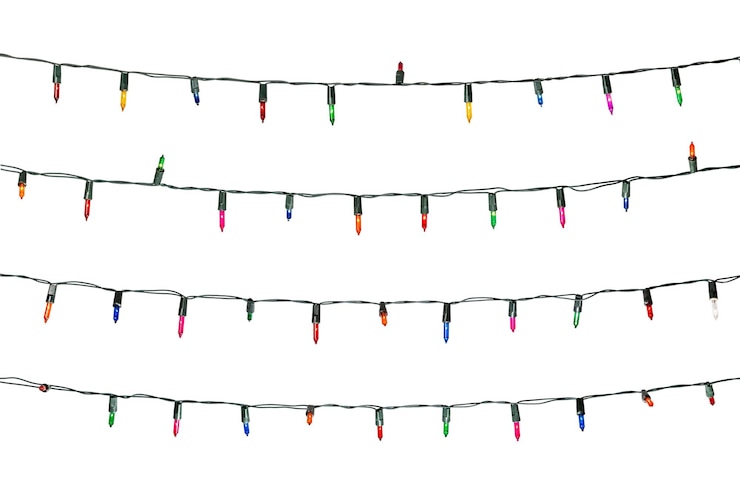 Foto weihnachtsbeleuchtung isoliert auf weißem hintergrund
