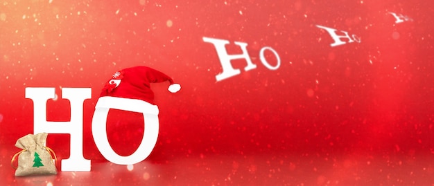 Weihnachtshintergrund mit der Aufschrift HoHoHo