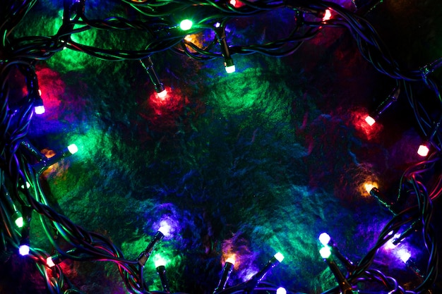 Weihnachtshintergrund mit Lichtern und Raum des freien Texts.