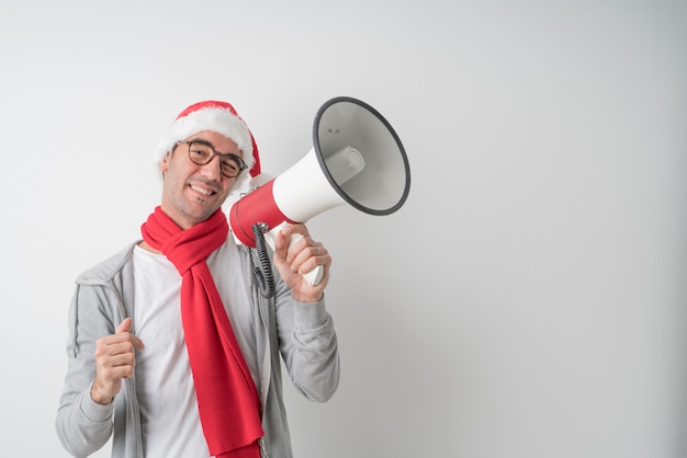 Weihnachtskonzepte - Gestikulieren des jungen Mannes