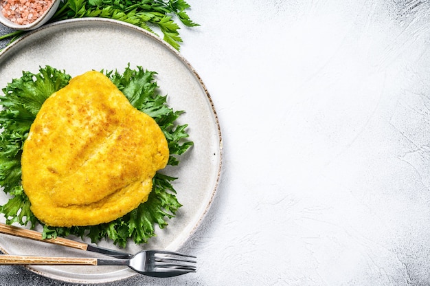 Weiner Schnitzel alemán empanizado.