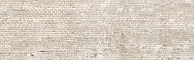 Weiß getünchtes altes Backsteinmauerpanorama